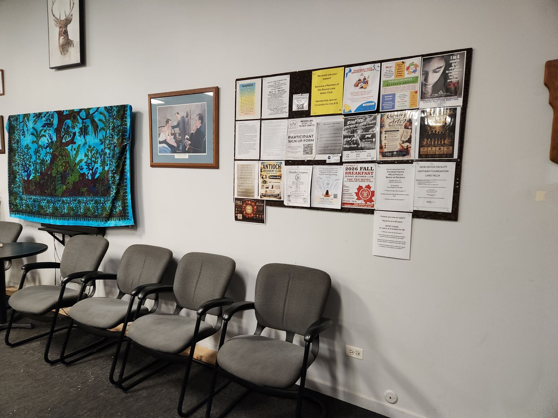 The club bulletin board covered in flyers for local recovery events